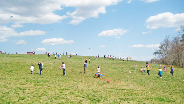 Families gathered on Hawks Ridge Hill in 2012 for FENCE’s annual Go Fly a Kite Day. (photo submitted)
