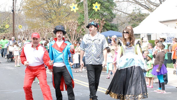 Performers from the 2012 Super Saturday event strut down the street in last year’s parade. The 35th Super Saturday Children’s Theater Festival begins with shows taking the stage at 9:30 a.m. Saturday, March 16. The event will include performances on multiple stages throughout the day, as well as street performers, food vendors, birthday cake and more. To find out more information, visit www.tryonsupersaturday.com. (photo by Leah Justice)