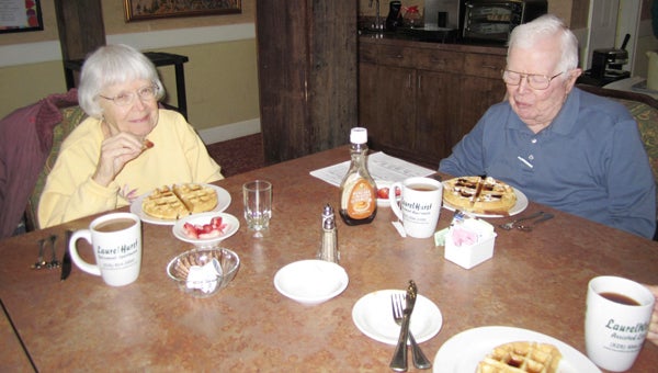 Laurel Hurst residents recently celebrated one of their favorite holidays - International Waffle Day. There were smiles all around as concierge Joan Bridges prepared homemade waffles and served them with strawberries. “This is great - International Waffle Day should be everyday,” said Linwood Williams between syrupy bites. Pictured above: Beach and Ted Tinnon. (photos submitted by Jennifer Thompson)