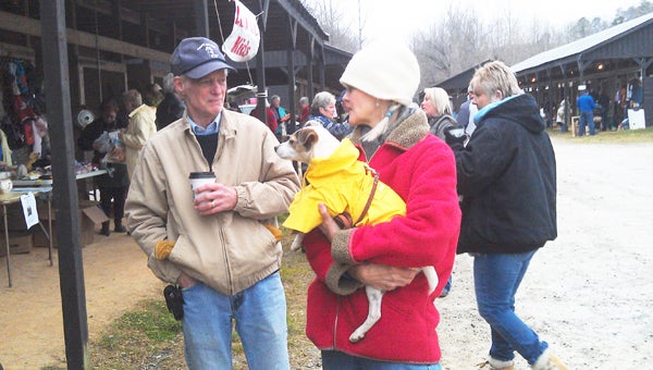 Gail Stockdale and Alice (her dog friend owned by Cindy and Ray Nordan), had a great time perusing the offerings at the FENCE yard sale on Saturday, March 23. (photo submitted)