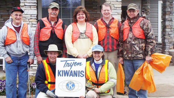 Hardy members of the Tryon Kiwanis Club battled gray skies, wind and the threat of rain to pick up litter along Hwy. 108 from the roundabout in Columbus to Harmon Field Road on Saturday, March 23. After meeting at the dining room at LaurelHurst Apartment Homes for a delicious breakfast, they paired up to walk along the highway collecting other people’s trash. It’s amazing what some people throw out – Andy Millard found a pair of broken eyeglasses, a pristine golf ball and a jar of pickled okra. Pictured above are those who helped with the cleanup: Butch Colosimo, Ernie Giannini, Jennifer Thompson, Bill Hague, Lee Cobourn, and Andy and Sharon Millard. Tryon Kiwanis Club holds the No. 1 position for state litter pick-up groups as the club was the very first to sign up for this job. (photo by Lynn Montgomery)