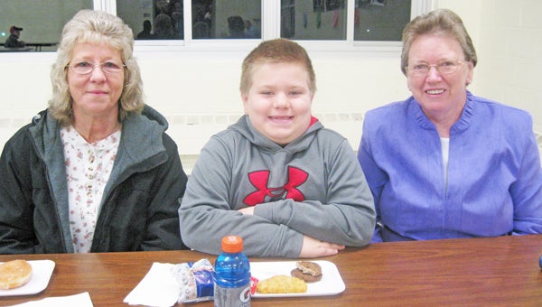 On March 15, Sunny View Elementary School held its annual Goodies for Grandparents celebration. Eighty-seven grandparents came to enjoy breakfast and special family time with their grandchildren. What a wonderful way to start the school day. Pictured here is Bryson Owen (second grade), with his grandmothers (left to right), Miriam Owen and Glenda Jackson. (photo by Angela Hall)