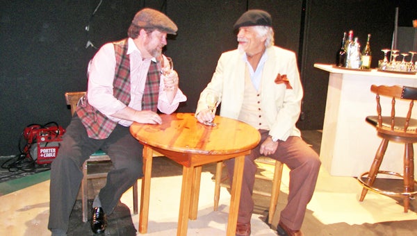 The dapper Gaston (Lou Buttino, right) regales Lapin Agile bar owner Freddy (Elvin Clark): “Women are my area of expertise. I glide among them, invisible in my new incarnation as an older man. Women respond differently to men of different ages.  I’m only newly old. Just getting used to it really.” Join them in 1904 Paris at the Lapin Agile (a real Paris bar, by the way). Steve Martin’s “Picasso at the Lapin Agile” plays the Tryon Little Theater Workshop April 18-21 and 25-28. For tickets, call 828-859-2466. (photo submitted by Connie Clark)