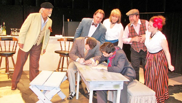 Albert Einstein (Joseph Clark) vs. Pablo Picasso (Tij D’Oyen) try to out-create each other, their pencils flashing across paper as patrons of the Lapin Agile – ladies man Gaston (Lou Buttino), art dealer Sagot (Ed Harrelson), waitress Germaine (Donna Everett), bar owner Freddy (Elvin Clark), and lovely young thing Suzanne (Katie Cilluffo – watch riveted. “Picasso at the Lapin Agile” plays the Tryon Little Theater Workshop April 18-21 and April 25-28. Tickets can be purchased by calling 828-859-2466. (photo submitted by Connie Clark)