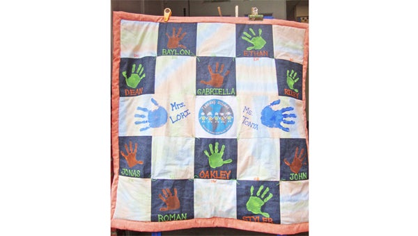 Handmade quilt by Tuesday School children will be auctioned during Spring Fling. (photo submitted)