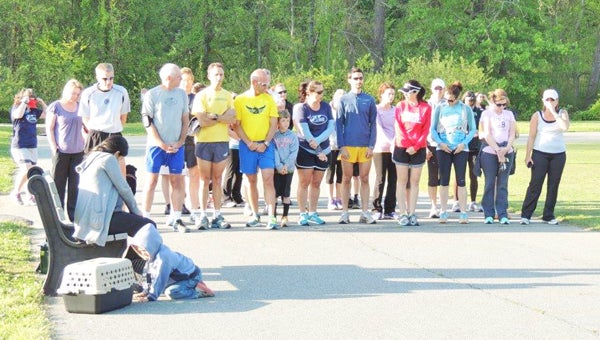 The Tryon Running Club hosted a run/walk on Monday, April 22 to honor the victims of the Boston Marathon tragedy last week. More than 30 runners and walkers from Polk and Henderson counties came to the event. Several runners were Boston finishers from past years. All enjoyed the fellowship of the running community at Harmon Field. (photo submitted by Laura Phelps)