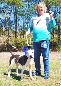 Volunteer Linda Williams and the graduating shelter dog she mentored, Zeus. (photo submitted)