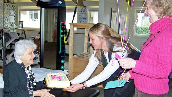 One of our founding Fitness Members at PRO Physical Therapy Health & Fitness Center in Columubs turns 97. Martha Fredrick of Tryon was greatly surprised when staff interupted her workout with birthday wishes, balloons and cake.  She works out faithfully three days a week. (photo submitted by Tammy Warren)