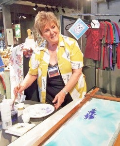 Christine Mariotti leads a silk painting class. (photo by Kiesa Kay)