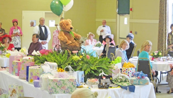 The Royal Tea Party held at Holy Cross on Friday, May 3 was a wonderful success.  More than 80 ladies and gentlemen attended, bringing mounds of baby gifts and supplies. The tea party/baby shower was a benefit for the Safety Net Program of the Polk County Partnership for Children and to replenish the Holy Cross Outreach Fund. Guest enjoyed delicious sweets and savories prepared by Holy Cross parishioners, along with authentic English tea on exquisite china.  The hostess was Pam Stone and guest included a contingent from Laurel Hurst. See www.tryondailybulletin.com for more photos. (photo submitted by Wanda May)
