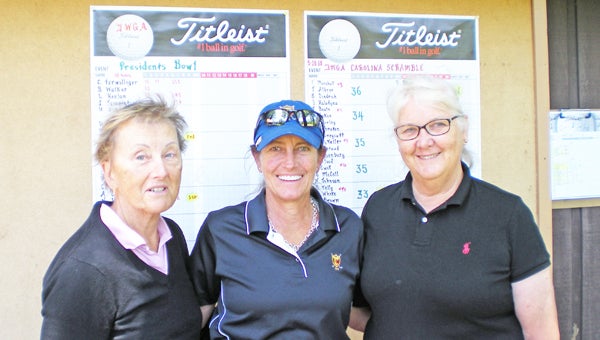 Lee Heelan captured the first major event on the women’s schedule at TCC by winning the 18-hole President’s Bowl with a two round net score of 67-76 = 143. Second place went to Jane Templeton with a score 78-76 = 154. The senior winner was Cynthia Terwilliger with a score of 76-77=153. In the nine-hole flight Nancy Hiley took first place with a score of 39-33=72. Second place went to Judy Muncy with a score of 41-33=74. Pictured above is Jane Templeton, Lee Heelan and Cynthia Templeton after the President’s Bowl. Not pictured are Nancy Hiley and Judy Muncy. (photo submitted by Marc Brady) 