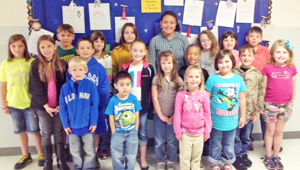 These students had their writing selection chosen to be featured on “Writing Space” at Polk Central during the month of April. Front row, left to right: Peyton Hoots, Joshua Chavez-Jaimes, Jaysa Reynolds and Taylor Russell. Middle row: Sabrina Ballard, Reilley Yoder, Madilyn Wilson, Tali Thompson, Keaundrae Green, Gauge Busbee and Lindsey Dotson. Back row: Madelyn Pittman, Isaac Edwards, Brittany O’Sullivan, Beth Stinchcomb, Maya Shade, Gracie Lee, Laura Packer and Malcolm Ward. Not pictured is Elizabeth Trejo-Mejia. (photo submitted by Lisa Pritchard)