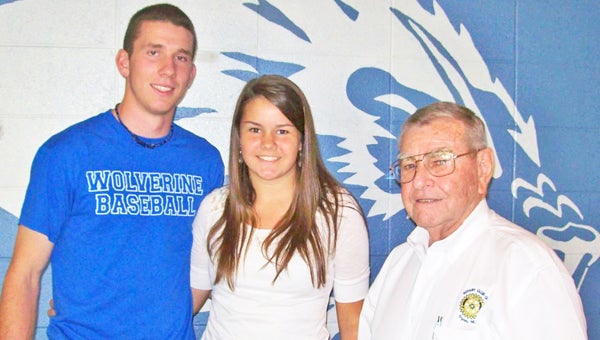 Dylan Turner, left, and Katelyn Ruff, middle, are pictured with Rotarian Paul Sutherland. These two outstanding Polk County seniors were two of the six seniors awarded scholarships as part of the 2013 Rotary Club of Tryon Scholarship Program. (photo submitted by Paul Sutherland)
