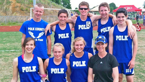 Polk’s 4x800 Meter Relay Men and Women (front, left to right) Shelby Wells, Lacee Keller, Shea Wheeler and Coach Jenny Wolfe; (back, left to right) Mitchell Brown, Eli Hall, Jacob Collins, Sean Doyle and Jacob Wolfe. The men’s team will advance to state finals. (photo submitted by Jenny Wolfe)