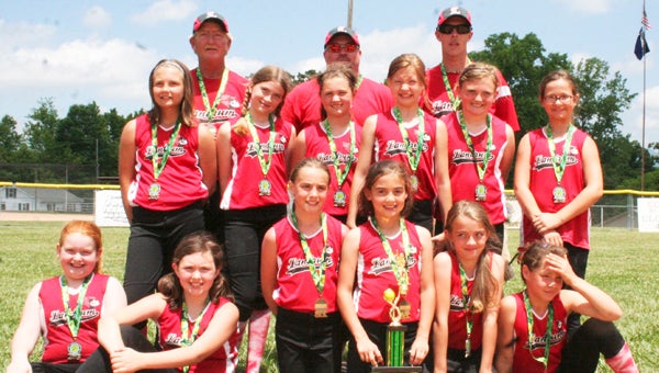 The Landrum Cardinals Red - Angels Division recently won the 2013 End of Season Tournament.  They also finished the season undefeated with a 12-0 record. Pictured front row, left to right: Ally Brock, Alexis Brown, Michelle Suddeth, Ali Allison, Molly Ellinger and McKenzie Suddeth; middle row, left to right, Jayden West, Aspen Fisher, Hannah Wood, Lexi Caudle, Shanna Davis and Grace Peeler; back row, left to right, Coaches Marion Price, Richie Lindsey and Brian Suddeth. (photo submitted) 