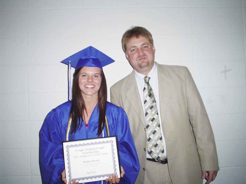 Shalyn Brown and SECU advisory board member Aaron Greene. 