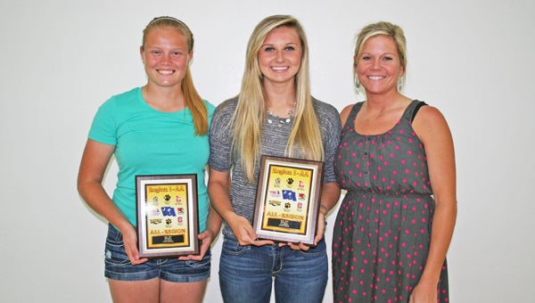 Landrum varsity softball players, pictured left to right: sophomore Taylor Wahler, freshman Sydney Davis, Coach Casey Smith, receive 2012-2013 Softball Region 1-AA All Region Players awards. (photo submitted by Coach Casey Smith) 