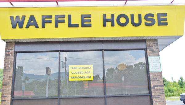 The Waffle House in Columbus is currently closed for remodeling. The store plans to reopen the first week in July. The sign on the door says, “We are sorry for any inconvenience. We are closed for remodel. Our plan is to reopen the first week of July. Thanks for your understanding. We can’t wait to see you again.” (photo by Leah Justice)