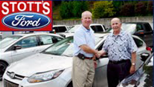A 2013 Ford Focus, generously provided by Stott’s Ford of Tryon, will be the hole-in-one prize at Steps to HOPE’s 10th Annual Golf Tournament this year. All proceeds from the tournament, held on Nov. 1, will support Steps to HOPE – Polk County’s non-profit domestic violence and sexual assault prevention and treatment center.  For more information, contact Steps to HOPE at 828-894-2340. (photo submitted by Debra Backus) 