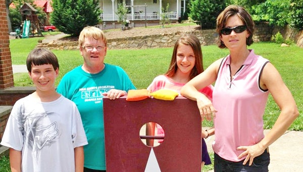 Polk County Recreation Department Summer Day Cornhole Tournament champions (left to right) Sam Miller, Recreation Director Patty Aldred, Galen Sachse and Jenny Wolfe. (photo submitted by Jenny Wolfe) 