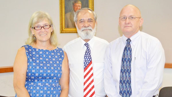 Sharon Goettert, Scott Woodworth and David Moore were sworn in Tuesday, July 16 as the new Polk County Board of Elections. (photo by Leah Justice)