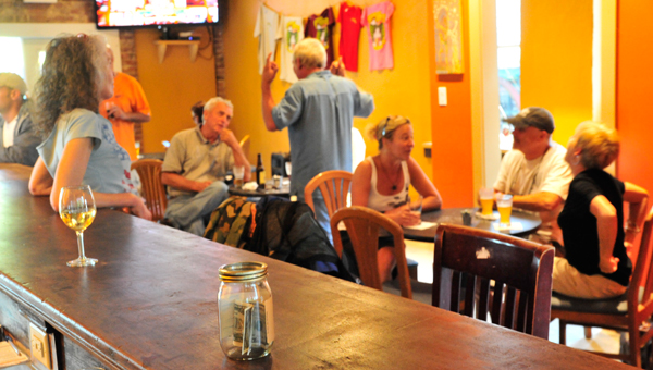 Patrons enjoy drinks and fellowship earlier this month at the newly opened Green River Brew Depot. (photo by Mark Schmerling)