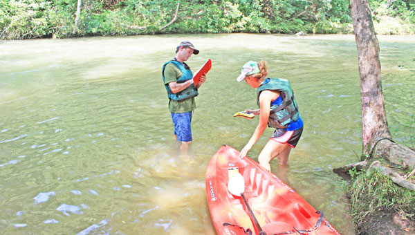 Zan Price and Natalie Bouchard with Altamont Environmental took to the Green River Saturday, July 20 to begin the consulting firms in-field study of the waterway as part of the Green River Watershed Alliance assessment. The assessment is funded by a grant from the N.C. Department of Environmental and Natural Resources (NCDENR).