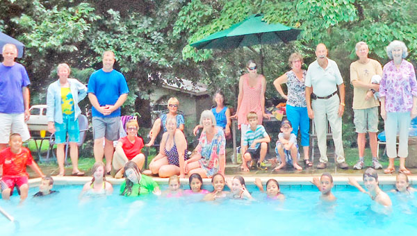 Polk County Big Brothers Big Sisters youth and mentors enjoy an end of summer pool party. (photo submitted)