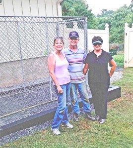 Heidi Mendez, DeHaven Batchelor and Deborah Batchelor lended their hardwork and donations to making the HOPE for Paws kennel at Steps to HOPE a reality. (photo submitted by Debra Backus)