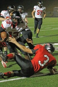 Aaron Bryant driving for the goal line. (photo by Lorin Browning)