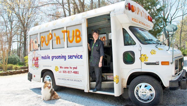 Vivian Cuddihee outside her Pup ‘N Tub mobile dog grooming van. (photos by Kirk Gollwitzer)