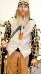 Green Creek resident, Thomas White, grew a beard and wore a Confederate soldiers uniform when he visited the history room at the Green Creek Heritage Festival. (photo submitted)