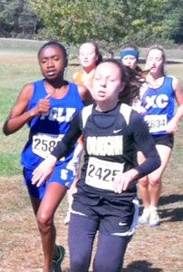 Polk County cross country runner India Godlock will be the school’s lone female qualifier for state. 