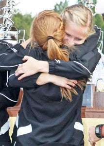 Bottom: Sarah cash and Elizabeth Walter embrace after the win.  (photos by Lorin Browning)