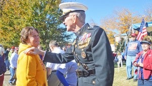 Linda McDaniel, whose son is serving in the  Marines, shook hands with Maj. Gen. James E. Livingston.