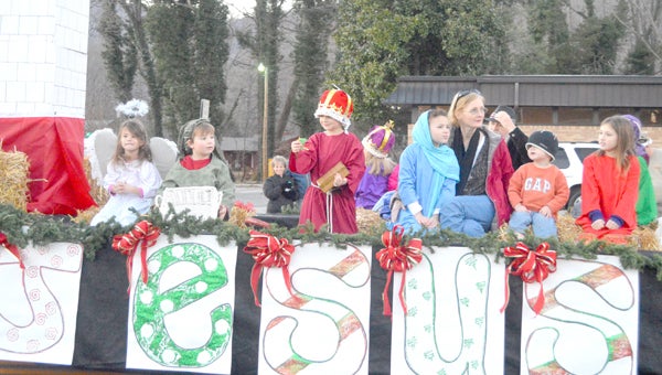 Midway Baptist Church youth dressed as characters from the Nativity story to share a message at the Columbus Christmas parade about the reason Midway’s members celebrate the season. (photo by Kiesa Kay)