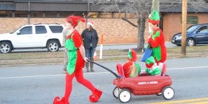 Elves trek through town as they make their way back to the North Pole to help Santa. (photos by Kiesa Kay)