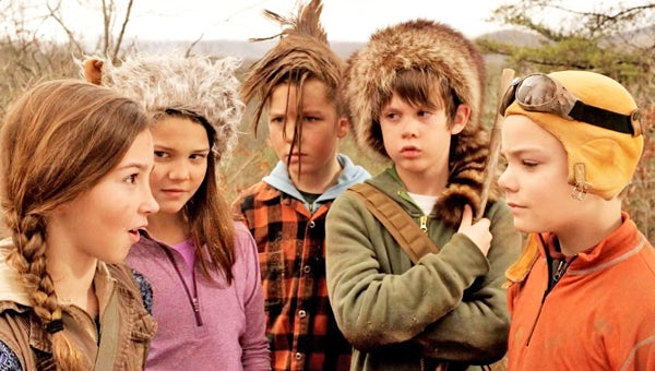 Sydney Waldman, far left, leads her posse of adventuresome friends on a imaginative journey through the woods in a commercial for Blossman Gas.