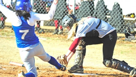 Polk’s Kailyn Brown is tagged out on this close play for at home (photo submitted)