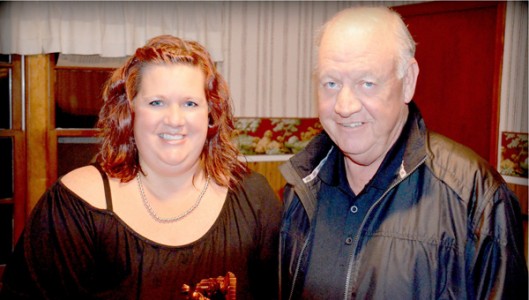 Kim Pack, 2013 Clarence G. Scoggins Firefighter of the Year recipient for the Tryon Fire Department is pictured here with her father Ronnie Pack, who received the same award as a volunteer with the Tryon Fire Department in  1977. Kim Pack is the department’s first female recipient of the award, which is voted on annually by members.  (photos submitted by Joey Davis) 