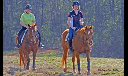 Trail Riders Lila Kilby & Alden Leavitt return to camp after an enjoyable day on the trails at the CIET Hunter Pace. (photos  by Lou Smith) 