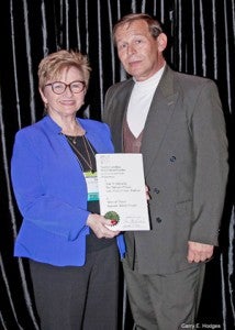 Promotion award – Dr. Pat Mitchell and Dr. Crys Armbrust 