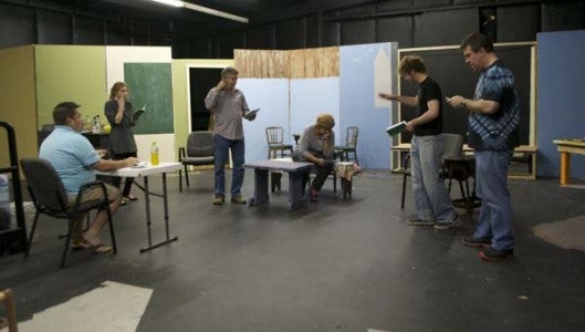 Cast members rehearse a scene for "Love, Sex, and the IRS."