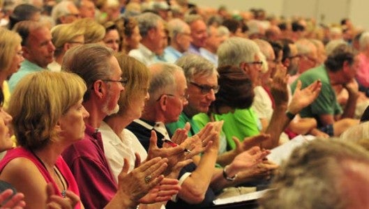 Filled to capacity, Blue Ridge Community College’s conference hall was the scene for last week’s eagerly anticipated questioning of Duke Energy officials by the public staff of the North Carolina Utilities Commission. (Photo by Mark Schmerling) 