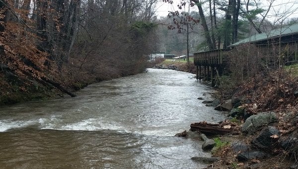 Grant funding will be used to stabilize and restore stream banks in sections that are unsightly and causing concern. The work will involve sloping the banks back and installing a native plant species to stabilize them. (Photo by Leah Justice)