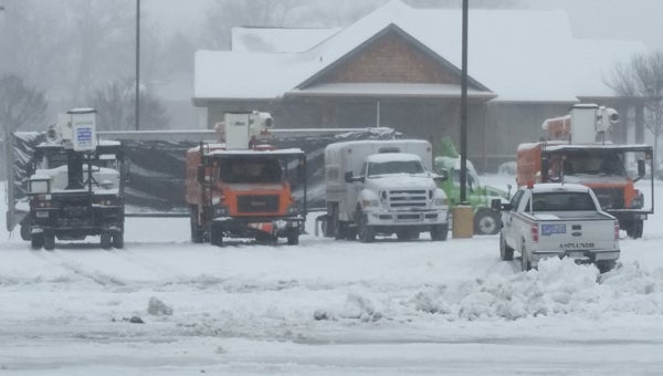 Power trucks at the Food Lion parking lot in Columbus. (photo by Leah Justice)