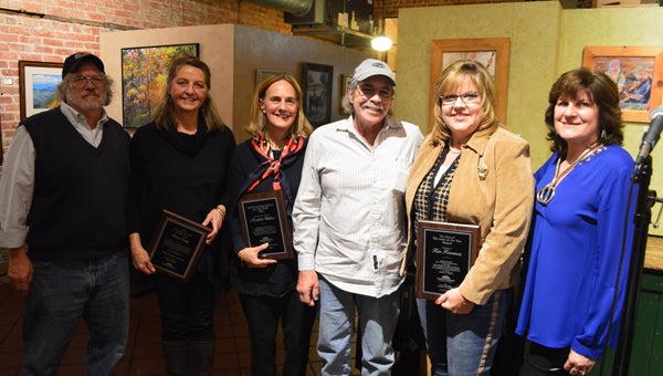 Six award winners received recognition at Tuesday night’s chamber of commerce annual dinner. Close to 45 members of the chamber convened at the Purple Onion to celebrate. From left to right are awards recipients Carl Wharton, Susan Brady, Madelon Wallace, Dennis Nagle, Kim Karaman and Carolina Foothills Chamber of Commerce Executive Director Janet Sciacca. Not pictured is John Vining, recipient of the Duke Energy Citizenship of the Year award, who was away coaching one of his two youth girls’ basketball teams. (Photo by Michael O’Hearn)
