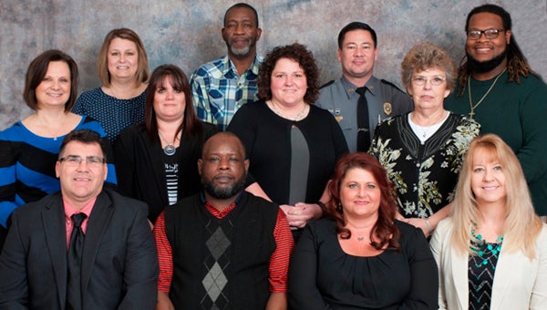 Front row: Jeff Wilson, Landrum High School; Fred Graham, Mabry Middle School; Dawn Nix, Swofford Career Center; Myra Campbell, Inman Elementary School. Second row: Sandy Nunnery, District One Administrative Office; Julie Smith, New Prospect Elementary; Stacy Moore, Campobello-Gramling School; Donna Larch, O.P. Earle Elementary. Back row: Julie McIntyre, Inman Intermediate School; Ronnie Brown, Landrum Middle School; Officer Greg Irwin, Chapman High School; and Desmond Sanders, Holly Springs-Motlow Elementary.