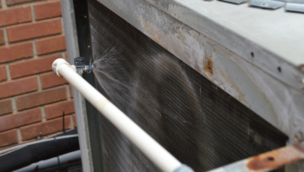 The outside air conditioning units of the jail have to be hosed down with water when it is hot or they won't run, sheriff Donald Hill told commissioners.