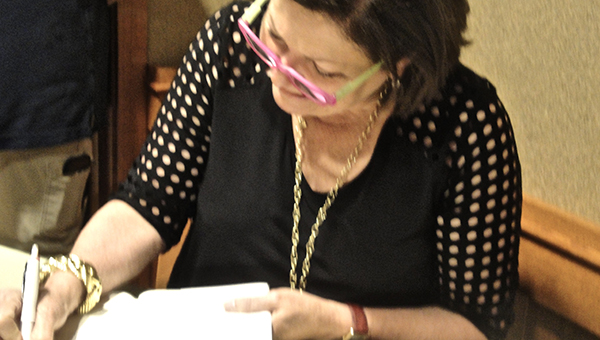 After the event, Dorothea Benton Frank signed free copies of her new book for the first 100 attendees.